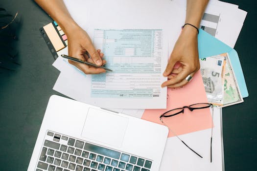 calculator and paperwork for mortgage refinancing