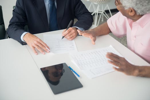 financial advisor reviewing documents
