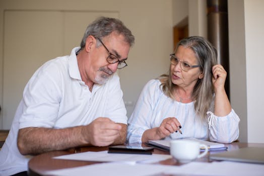 senior couple discussing finances