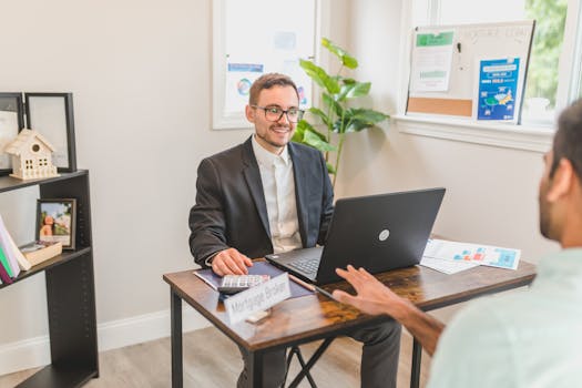 man reviewing mortgage documents with calculator