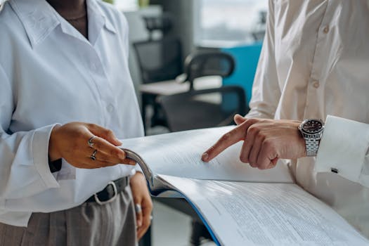 engineer reviewing financial documents