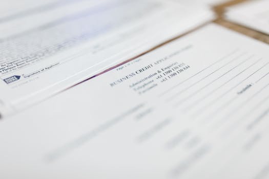 tax forms and calculator on desk