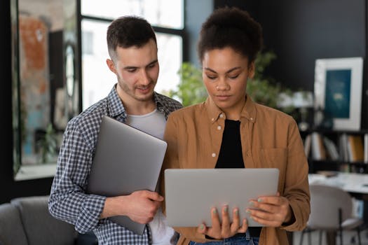 person using a laptop to check mortgage rates