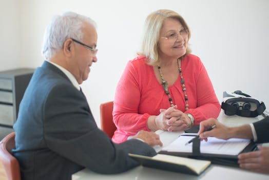 mortgage broker explaining financial options to a couple