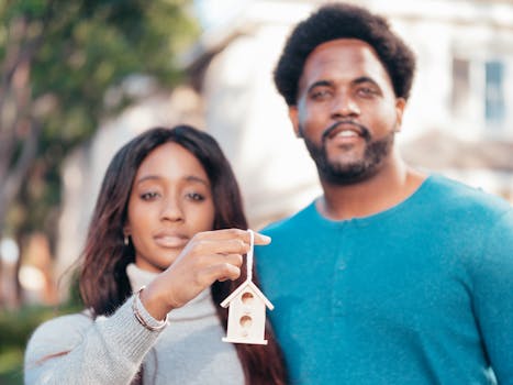 happy couple celebrating mortgage payoff