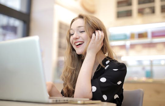 person using laptop to pay mortgage online