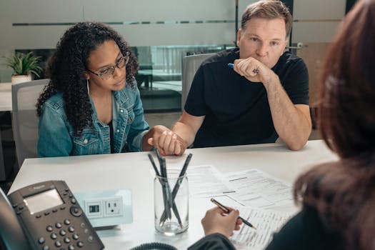 family discussing financial plans with an advisor